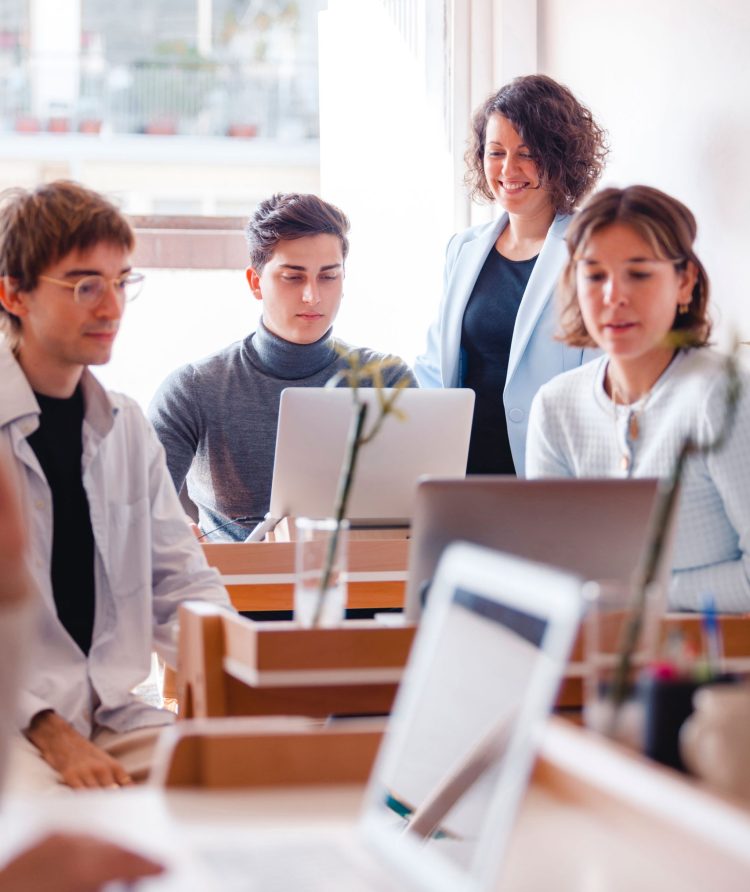 group-of-business-people-working-at-desk-in-office-2025-03-10-12-31-18-utc
